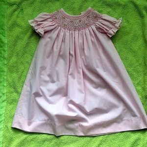 Smocked newborn day dress.
